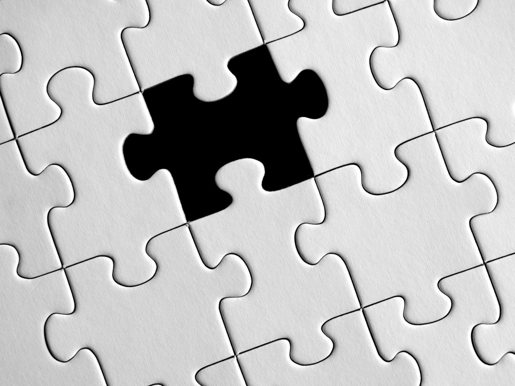 Puzzle with a missing piece.