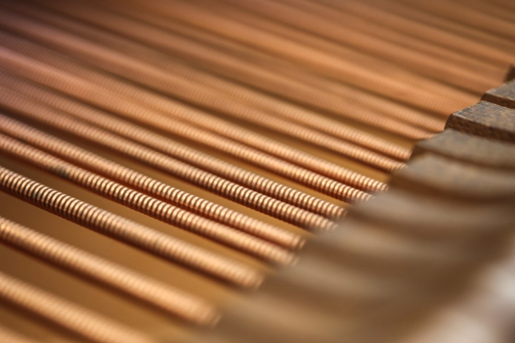 Strings under tension in a piano.